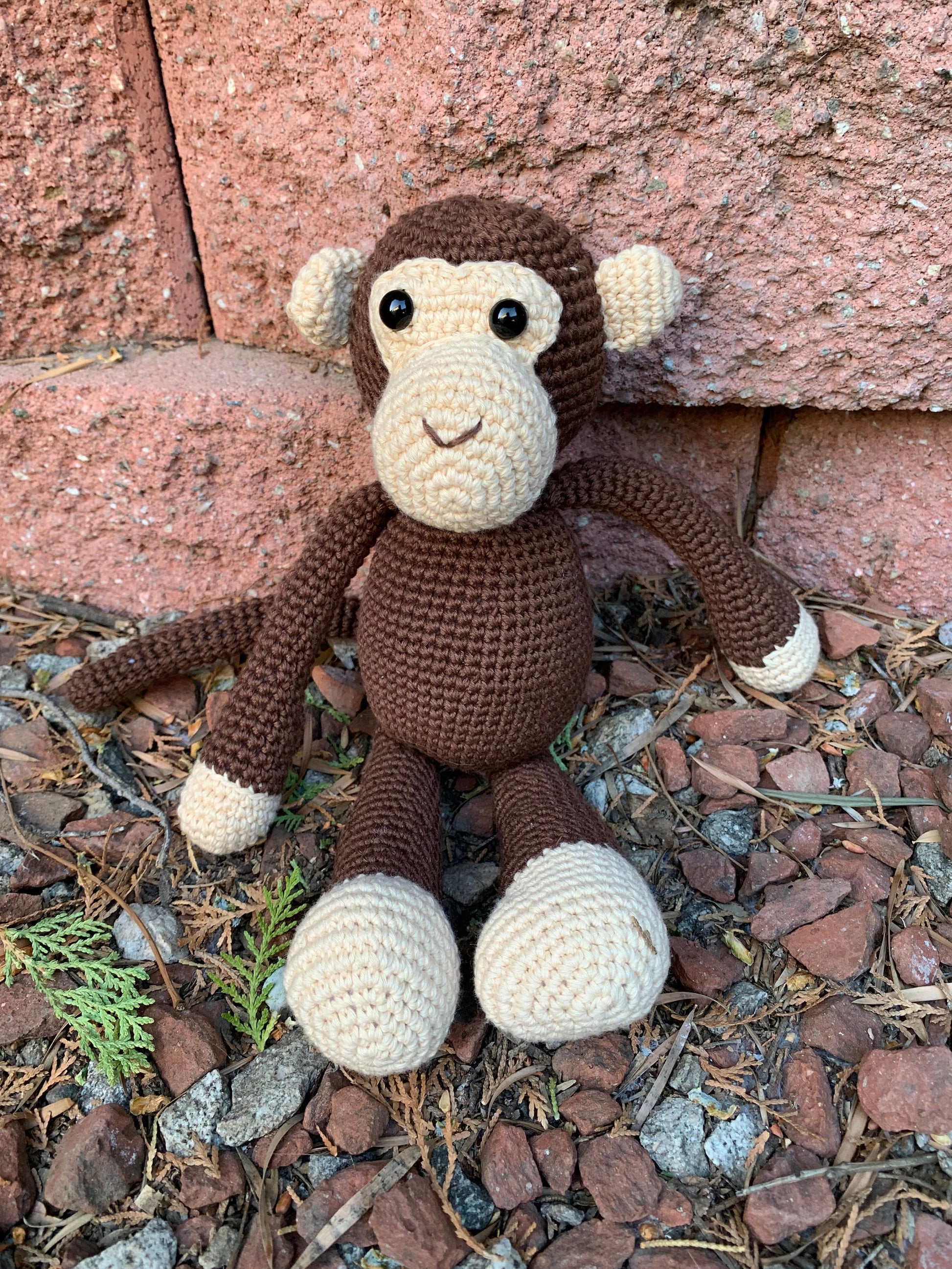  little stuffed monkey, cute plush monkey, cute monkey plush toy, cute monkey soft toy, brown plush monkey, brown stuffed monkey, brown monkey plush, cuddly monkey, monkey figurine, stuffed monkey toy, crochet monkey, mini monkey